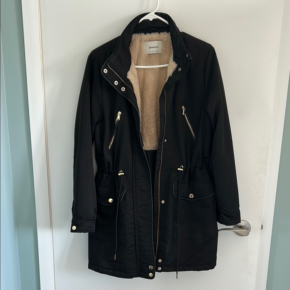 Black Jacket with Gold Accents